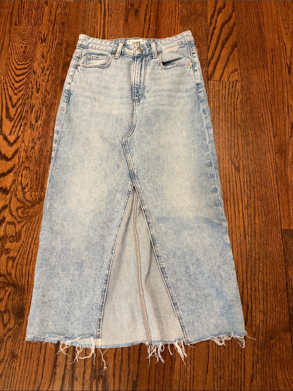 PAIGE Light Wash Denim Skirt with Raw Hem sz 24